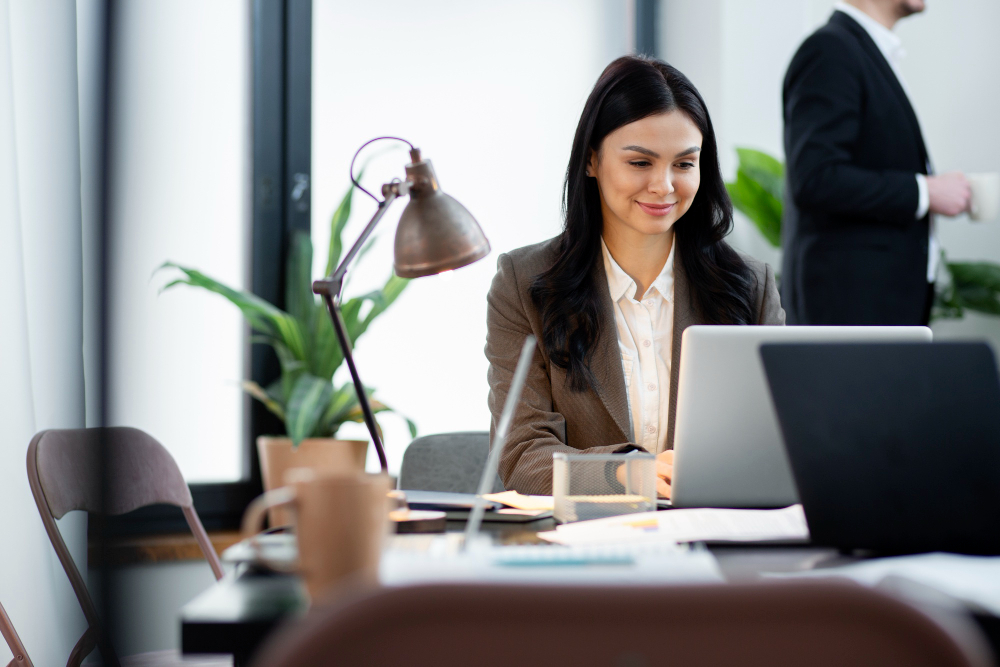 women working on laptop in the office